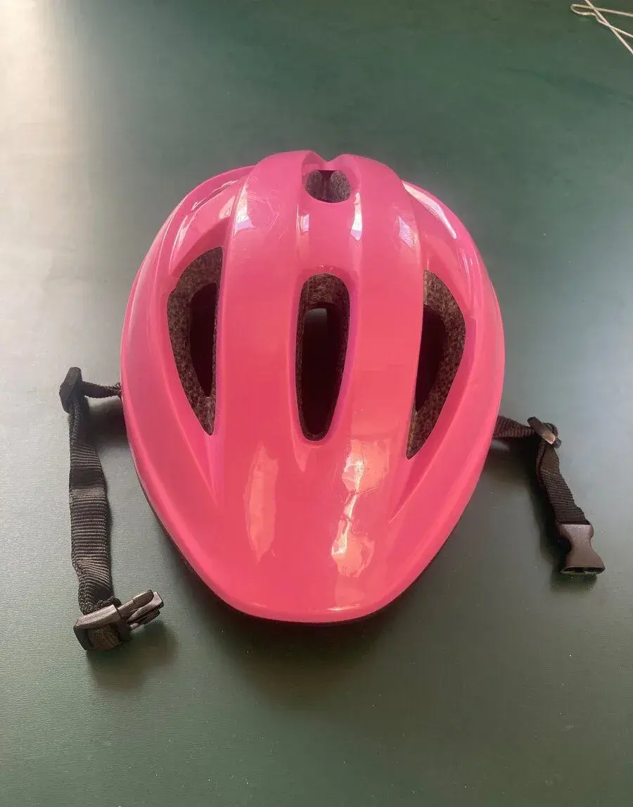 Dětská růžová cyklistická přilba