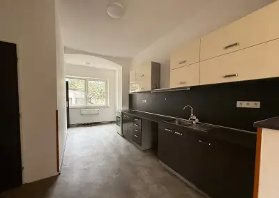 Pronájem útulného bytu 1+1 se zahradou v rodinném domě, ul.