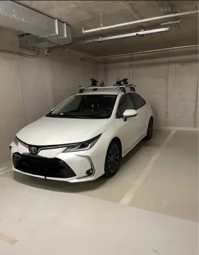 Atera střešní nosič + 2× držák na kolo – Corolla Sedan 2019