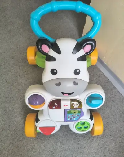 Fisher Price chodítko žirafa