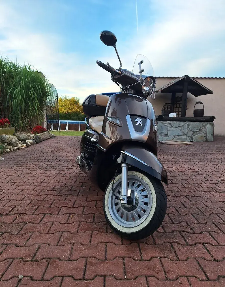 Peugeot Django 125 (v textu )