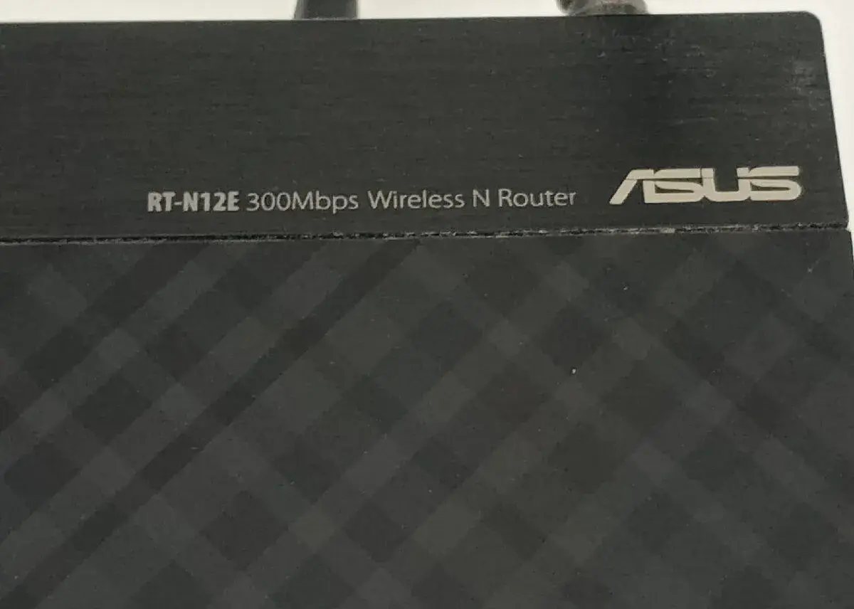 Wi-Fi router ASUS RT-N12E plně funkční 300Mbps.