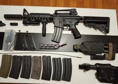 Airsoft Celokov M4 LMT 8x kovový zásobník + výstroj Flecktar