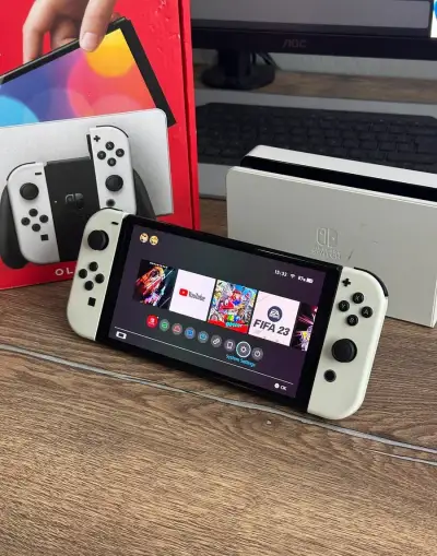 Nintendo Switch OLED bílý + 5 her + 128GB + pouzdro