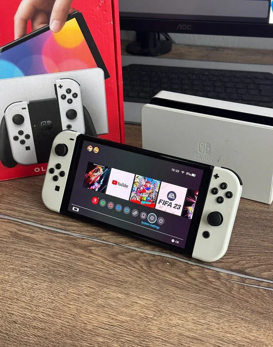 Nintendo Switch OLED bílý + 5 her + 128GB + pouzdro
