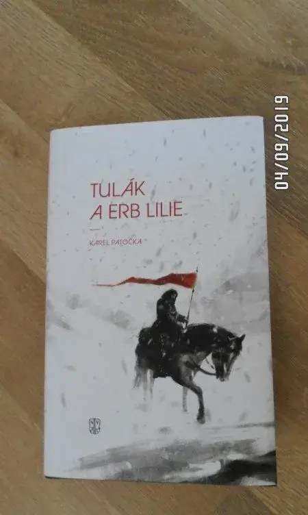 Karel Patočka, Tulák a erb lilie