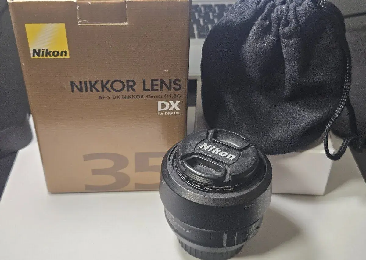 Nikon 35mm f/1.8 – stav, kompletní balení + UV filtr