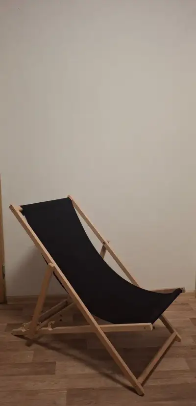 Černé látkové lehatko