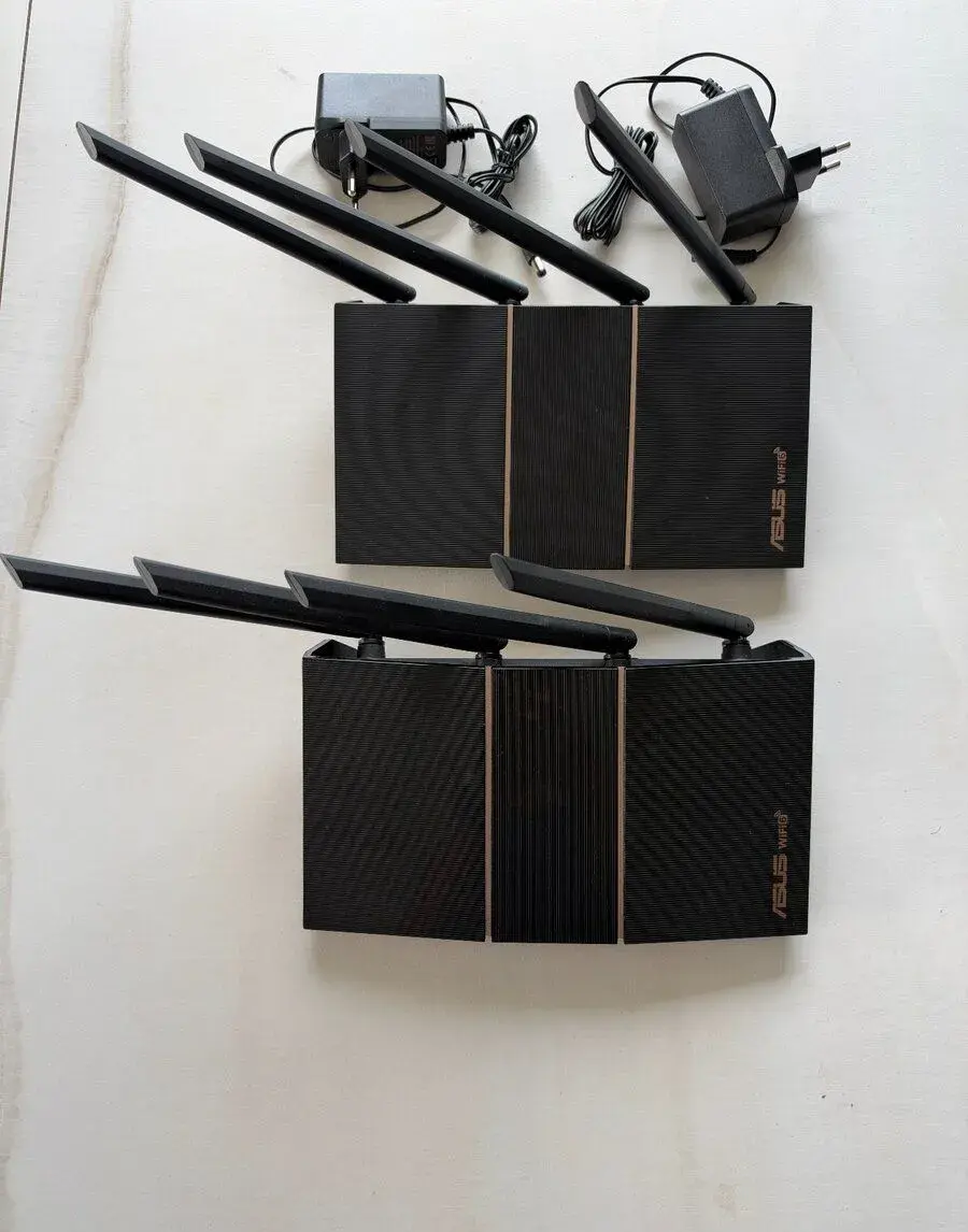 2× Wi-Fi router ASUS RT-AX57 (AX3000).