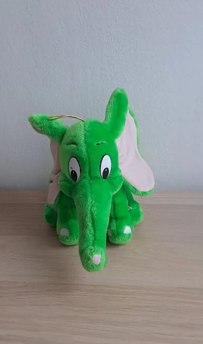 Plyšový slon sedící zelený.