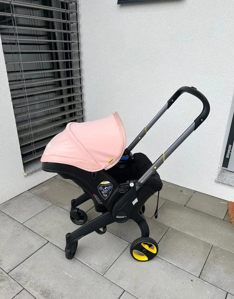 Doona+ – autosedačka a kočárek 2v1, růžová