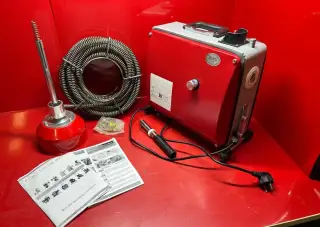 Elektrická čistička odpadů a potrubí (motorový krtek)